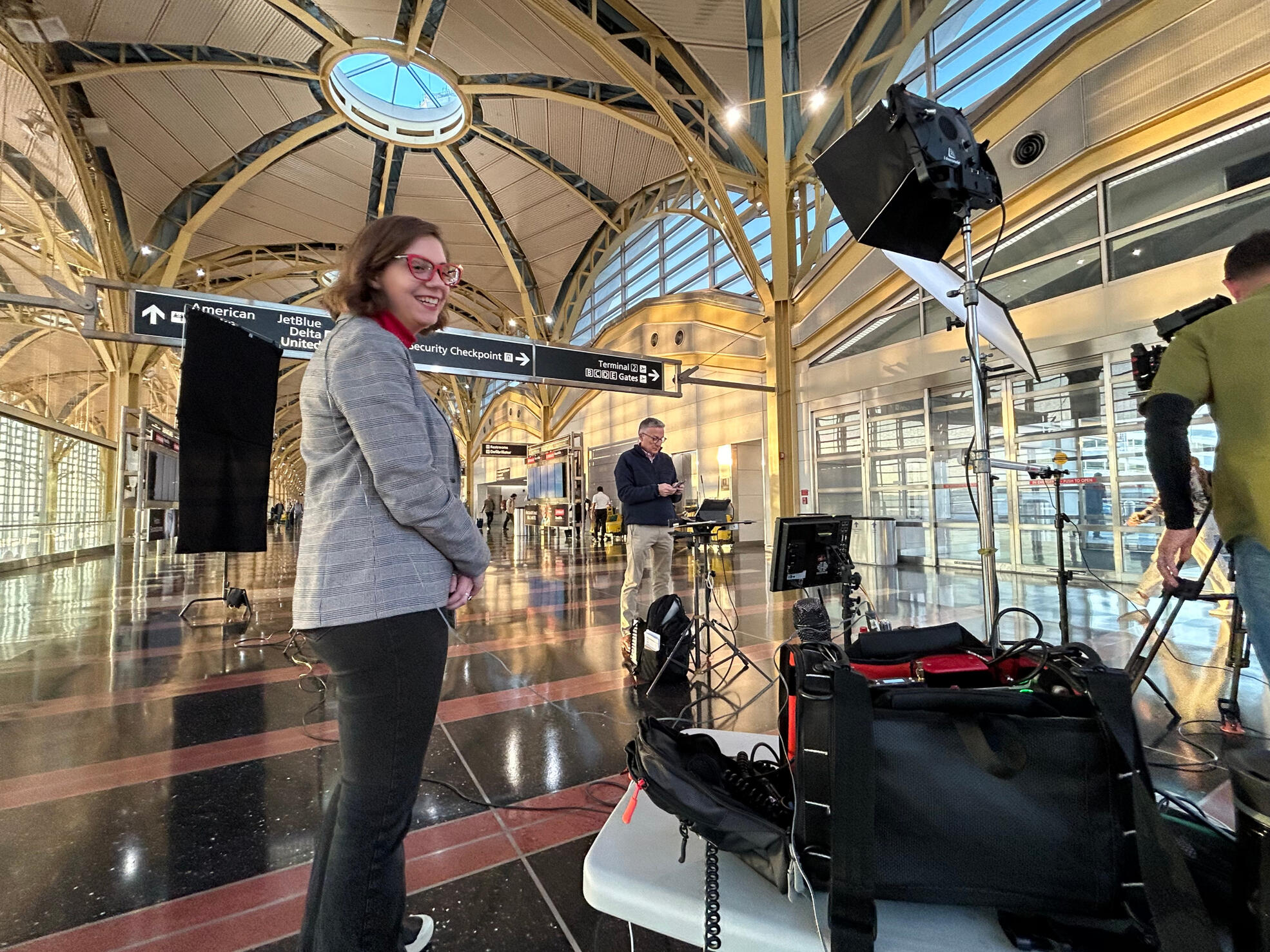 In the Field with Tom Costello and Crew At DCA