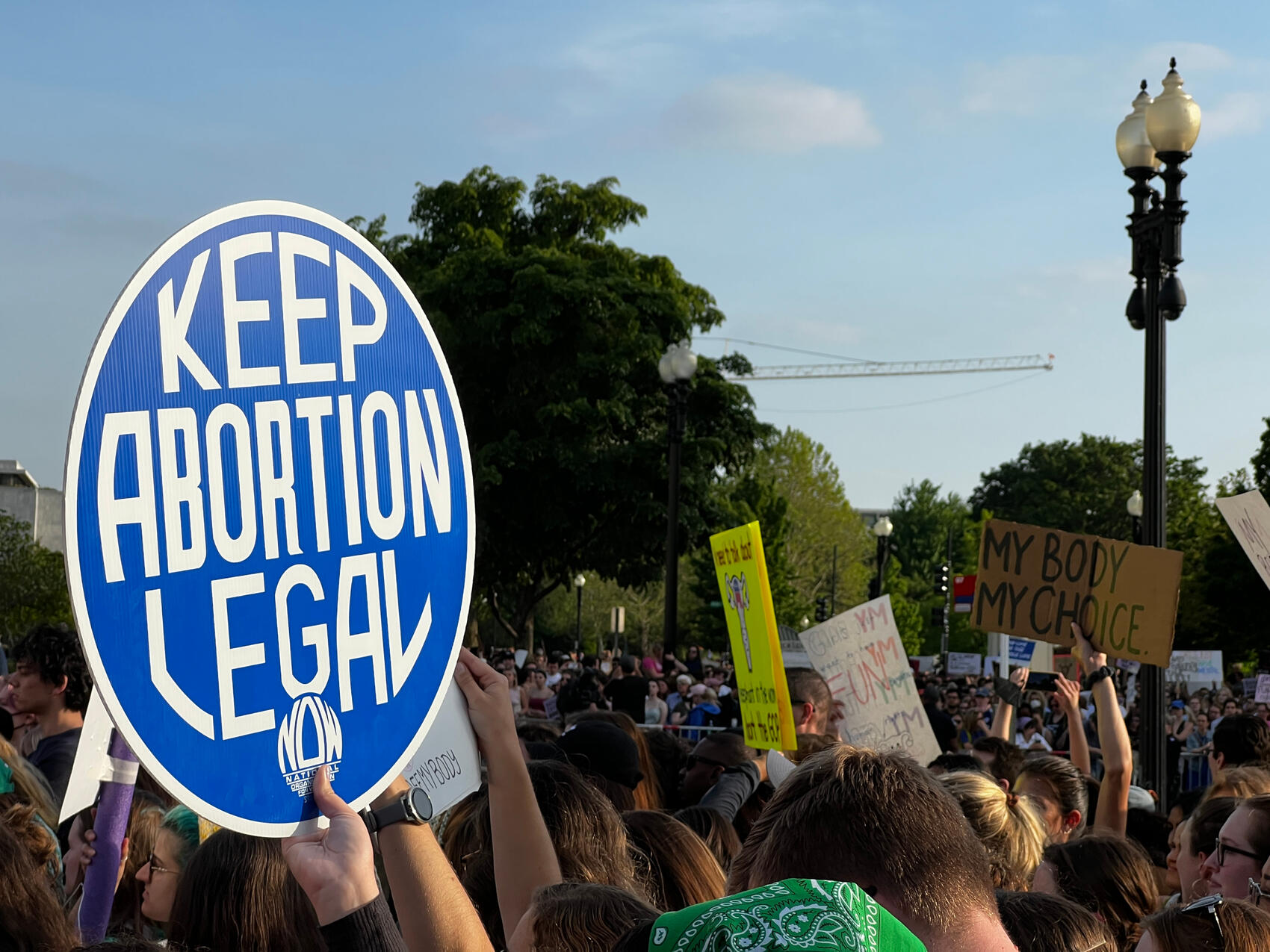 Protest signs outside SCOTUS 4/3/22